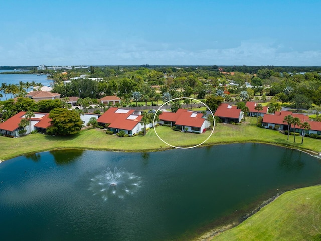 bird's eye view with a water view