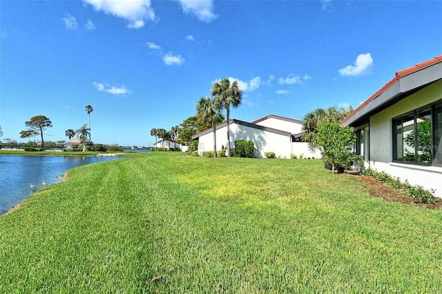 view of yard with a water view