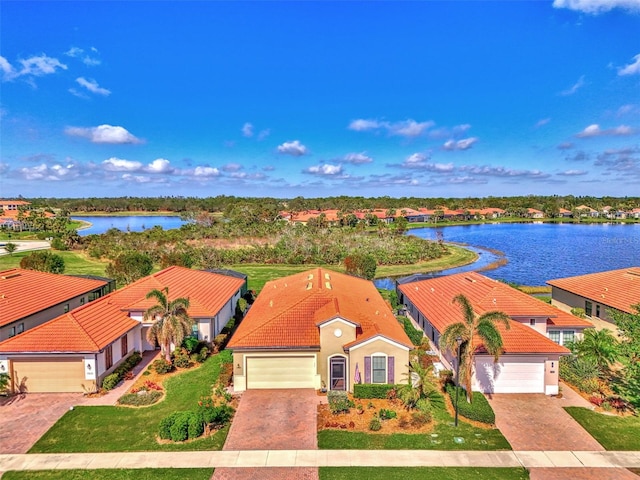 view of front of house featuring a water view and a garage