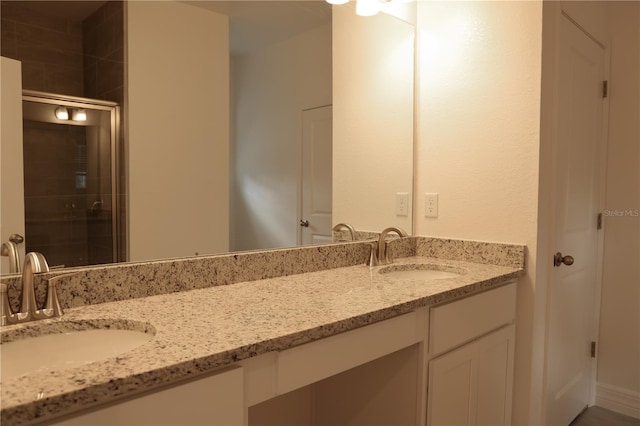 bathroom featuring vanity and walk in shower