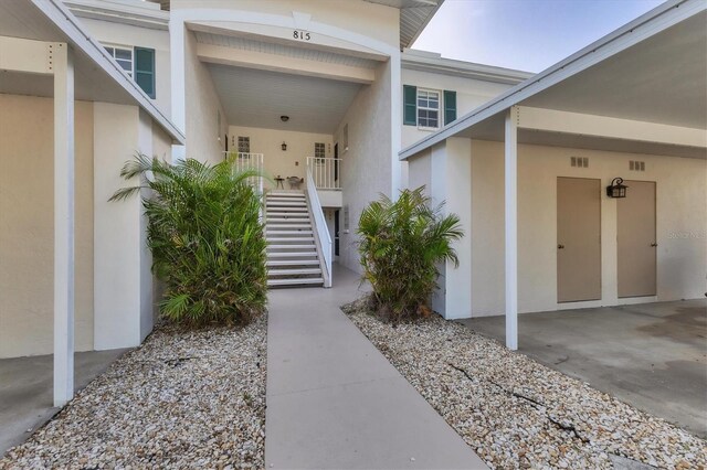 815 Montrose Dr Unit 103, Venice, FL 34293 - view of exterior entry with stucco siding