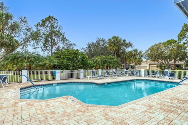 view of pool featuring a patio area