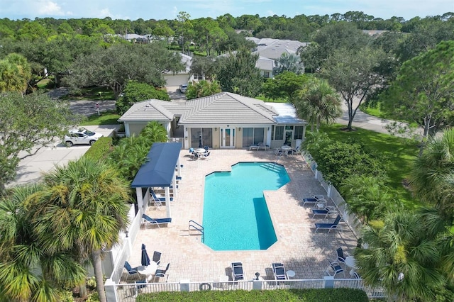 view of swimming pool featuring a patio area