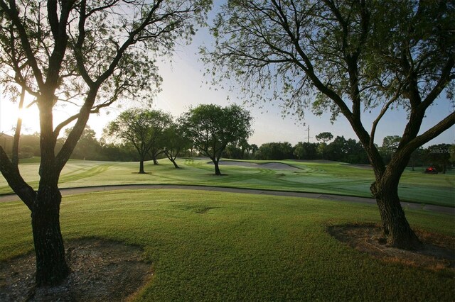 815 Montrose Dr Unit 103, Venice, FL 34293 - view of home's community featuring golf course view and a lawn