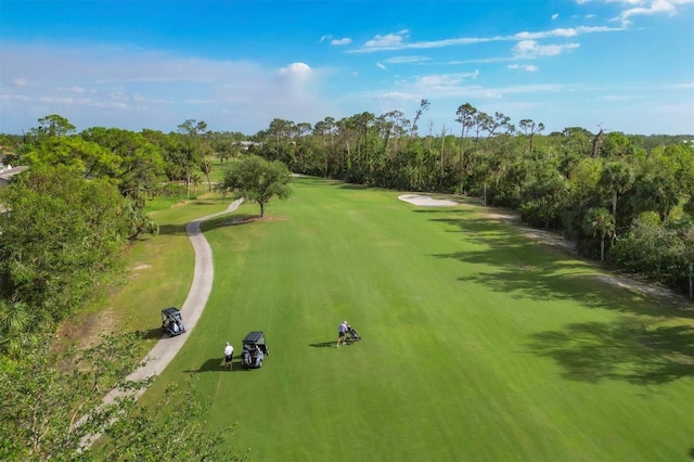 815 Montrose Dr Unit 103, Venice, FL 34293 - view of property's community featuring view of golf course and view of scattered trees