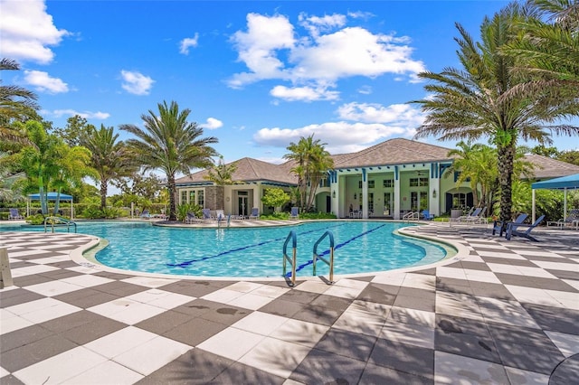 view of swimming pool featuring a patio