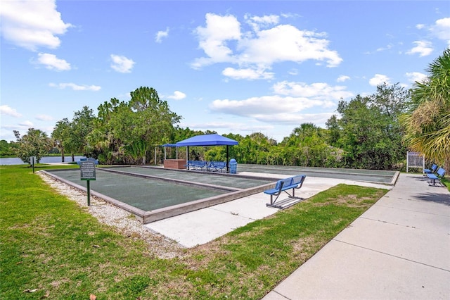 view of home's community featuring a yard