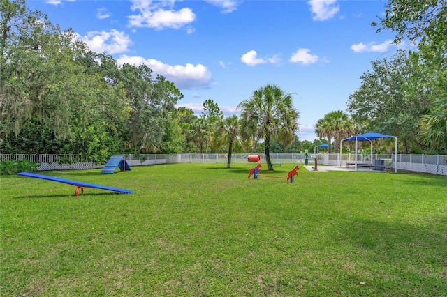 view of community with a yard