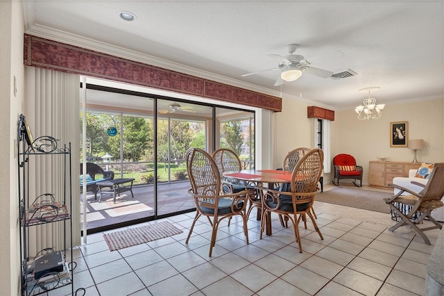 tiled dining room with crown molding and ceiling fan with notable chandelier