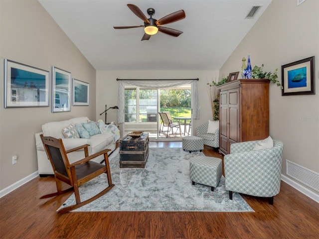 living room featuring ceiling fan, dark hardwood / wood-style flooring, and lofted ceiling