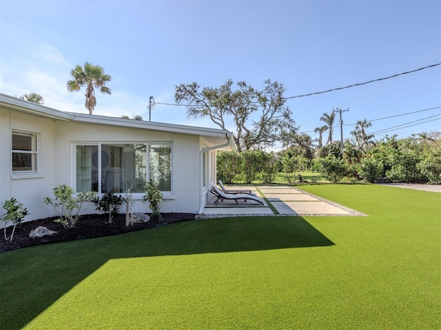 view of yard with a patio