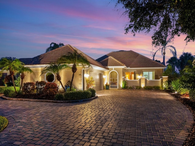 view of front of property featuring a garage