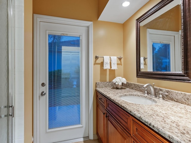 bathroom with vanity and walk in shower