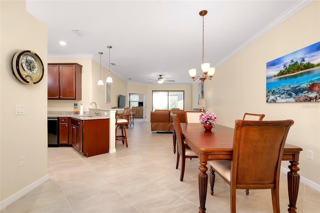 dining room with ceiling fan with notable chandelier, light tile patterned flooring, ornamental molding, and sink