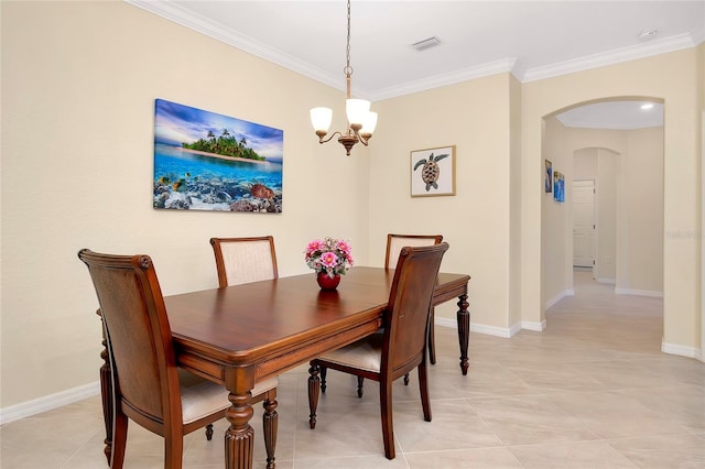 tiled dining room with ornamental molding and a notable chandelier