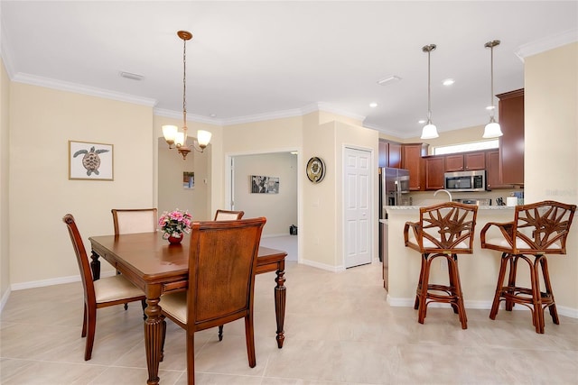 tiled dining room with a chandelier and ornamental molding