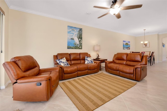 living room featuring ceiling fan with notable chandelier, light tile patterned floors, and ornamental molding