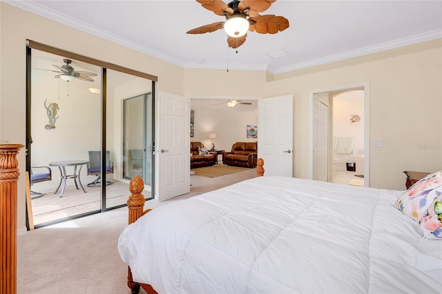 carpeted bedroom with ceiling fan, crown molding, and a closet