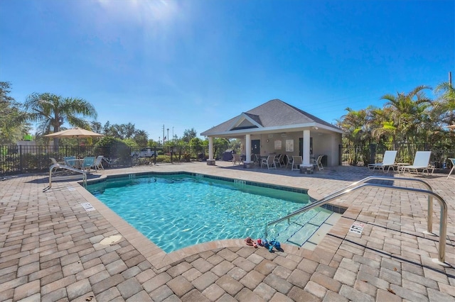 view of swimming pool featuring a patio