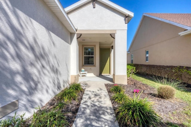 doorway to property featuring a patio