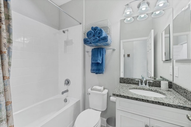 full bathroom with shower / bathtub combination with curtain, vanity, and toilet