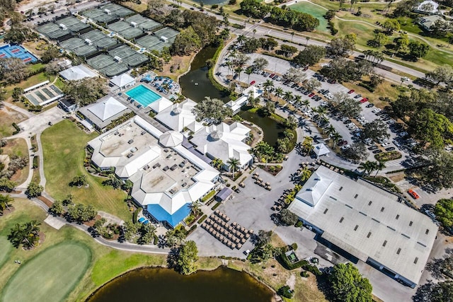 birds eye view of property with a water view