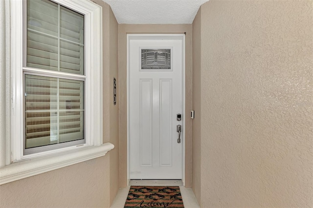 830 The Esplanade N Unit 203, Venice, FL 34285 - property entrance with stucco siding