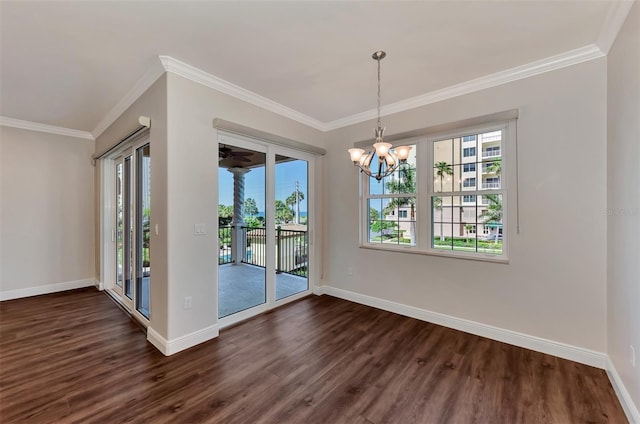 unfurnished dining area with a chandelier, dark hardwood / wood-style flooring, and crown molding