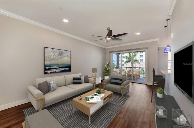 living room featuring ceiling fan, crown molding, and dark wood-type flooring