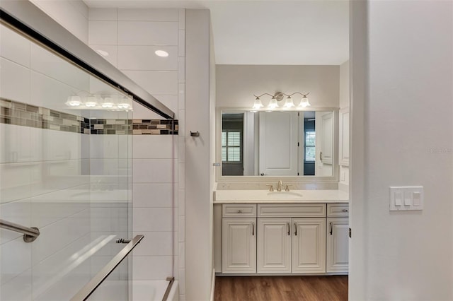 bathroom featuring vanity and hardwood / wood-style flooring