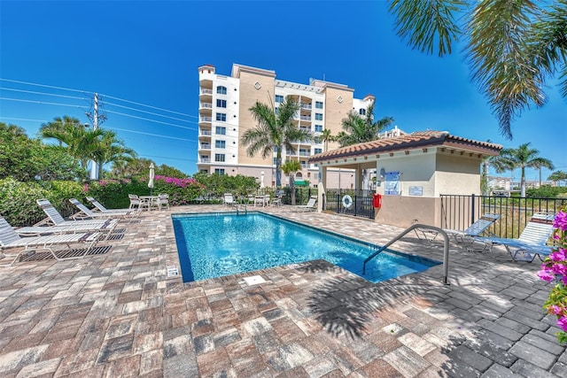 view of swimming pool featuring a patio area