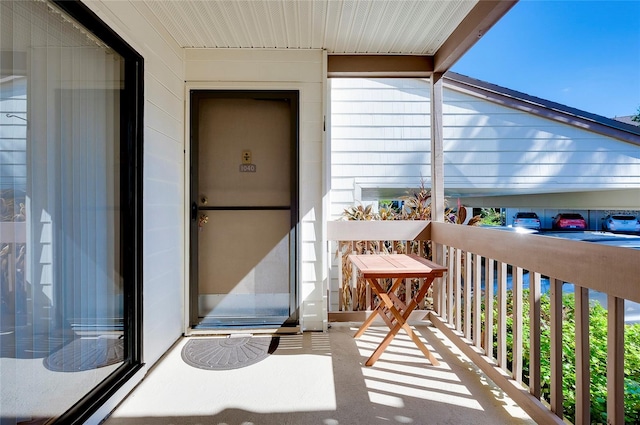 property entrance with a balcony