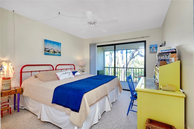 carpeted bedroom with access to outside and ceiling fan