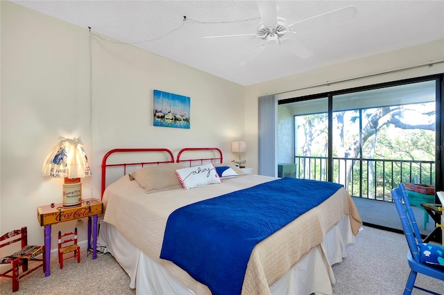 carpeted bedroom with access to exterior and ceiling fan