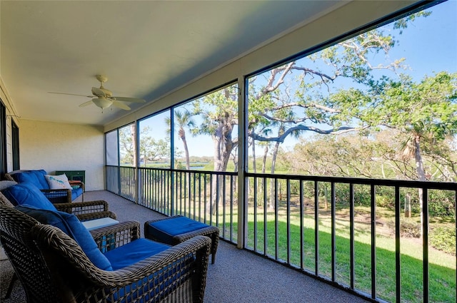 sunroom / solarium with ceiling fan