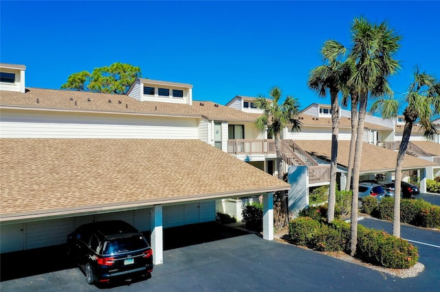 view of front of property with a carport