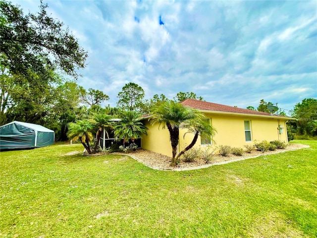 exterior space featuring a yard