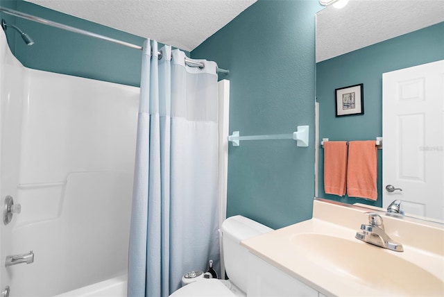 full bathroom with vanity, shower / bath combination with curtain, a textured ceiling, and toilet