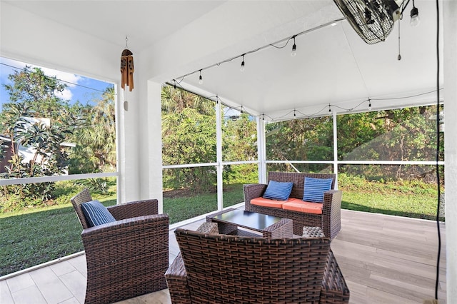 sunroom featuring a wealth of natural light