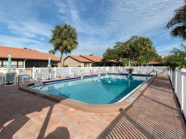 view of pool with a patio area