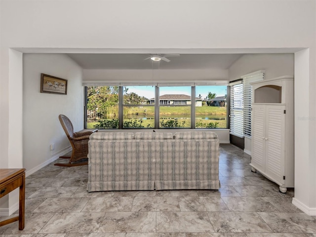 living room with ceiling fan