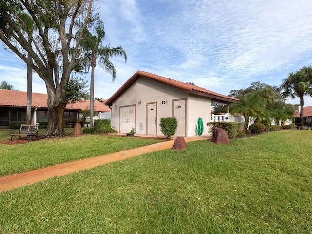 exterior space featuring a lawn