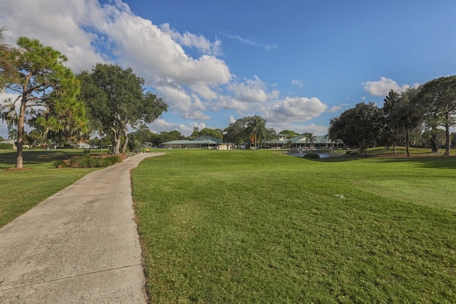 view of home's community featuring a yard