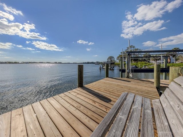 view of dock with a water view