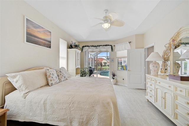 bedroom featuring access to outside and ceiling fan