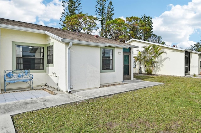 exterior space featuring a front lawn