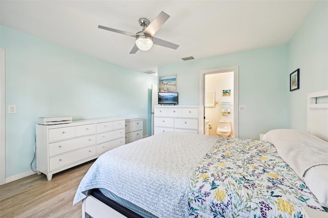 bedroom featuring ceiling fan, connected bathroom, and light hardwood / wood-style flooring