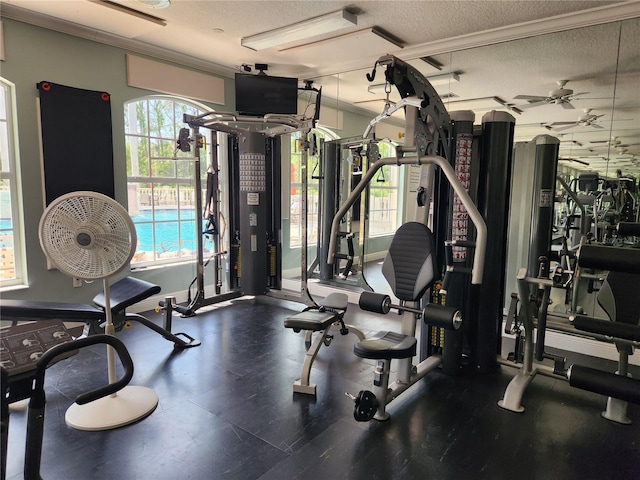 gym featuring a textured ceiling