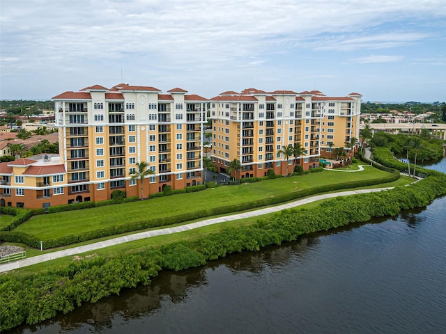 view of building exterior featuring a water view