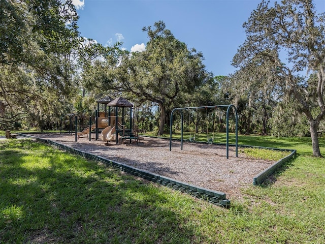 view of play area with a yard